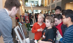 CS students explain their research to children at BOOM (Bits on our Mind)